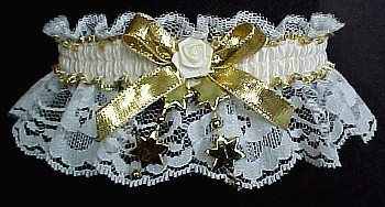 Ivory Moire Band with a Gold Edge and Gold Metallic Bow on Ivory Lace. Your choice of Star, Fancy Flat Pearl, Crimped Pearl, or Heart Trim. MyGarters, MyGarter, My Garters, My Garter, MyBridalGarter, MyPromGarter, MyPromGarters, garter, garders, garder
