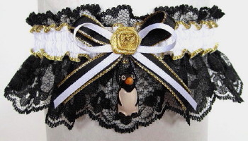 Penguin Garter in black and white. B&W Penguin Garter on black lace. garders, garder