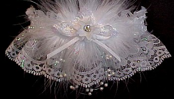 Keepsake Crystal Rhinestone Wedding Garter Bridal Garter on white lace. garders, garder