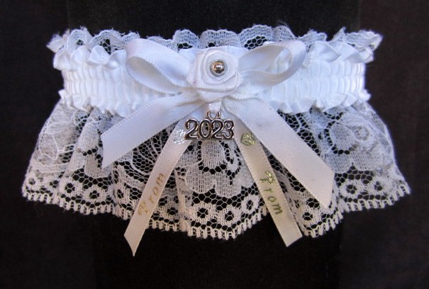 2023 Prom Garter Special on white lace with Prom imprinted ribbon tails & Year Charm. Prom garter tradition. Prom garters online. garder, garders