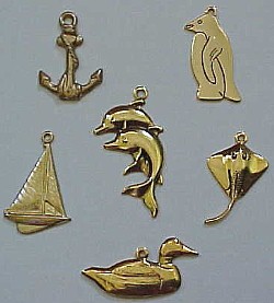 Charms. Anchor, Penguin, Sailboat, Dolphins, Stingray, Duck